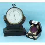 A French holosteric barometer, the white dial marked 'W Heath of Plymouth', 12cm diameter, on