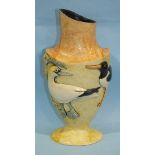 Anna Lambert, a studio pottery vase with applied bird decoration on a cream ground, painted orange