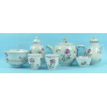 An 18th century Chinese famille rose part tea service decorated with scattered flowers, comprising