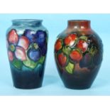 A Moorcroft flambé vase decorated with clematis, 13cm high, impressed factory mark, late Queen