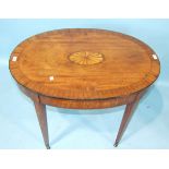 An antique oval occasional table, the top cross-banded and inlaid with motif, on square tapered legs
