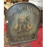 A painted wood tavern sign 'The Schooner Tavern', decorated with a two-masted schooner within a rope