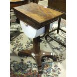 A William IV mahogany work table, the rectangular fold-over top and interior compartment above a