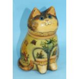 A Rye Pottery figure of a seated cat designed by Joan and David de Bethel, Rye, Sussex, decorated