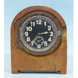 A WWII German Heereseigentum duty clock with black 6.5cm circular numerical dial, subsidiary seconds