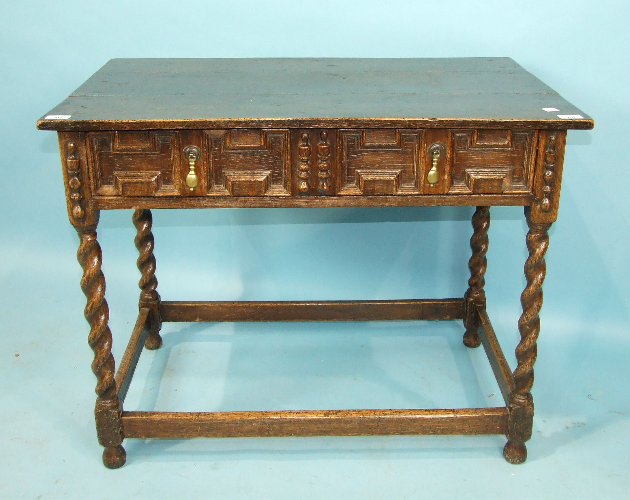 An antique oak rectangular side table in the 17th century style, having a single frieze drawer, on - Image 3 of 3