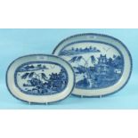 An 18th century Chinese Export blue and white oval landscape dish and a similar smaller example,