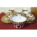 A Royal Crown Derby Imari pattern part tea service comprising of six cups and saucers, six side