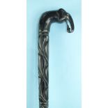 A Victorian carved ebony walking stick, the handle carved with an elephant and a crocodile, 94cm