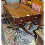 An early-19th century mahogany breakfast table, the rectangular top with two drop leaves and