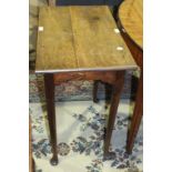 An oak rectangular occasional table on turned legs with pad feet, 69 x 42cm.