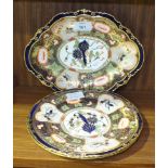 A pair of Royal Crown Derby Imari pattern circular dishes and a similar oval dish c1910, oval dish