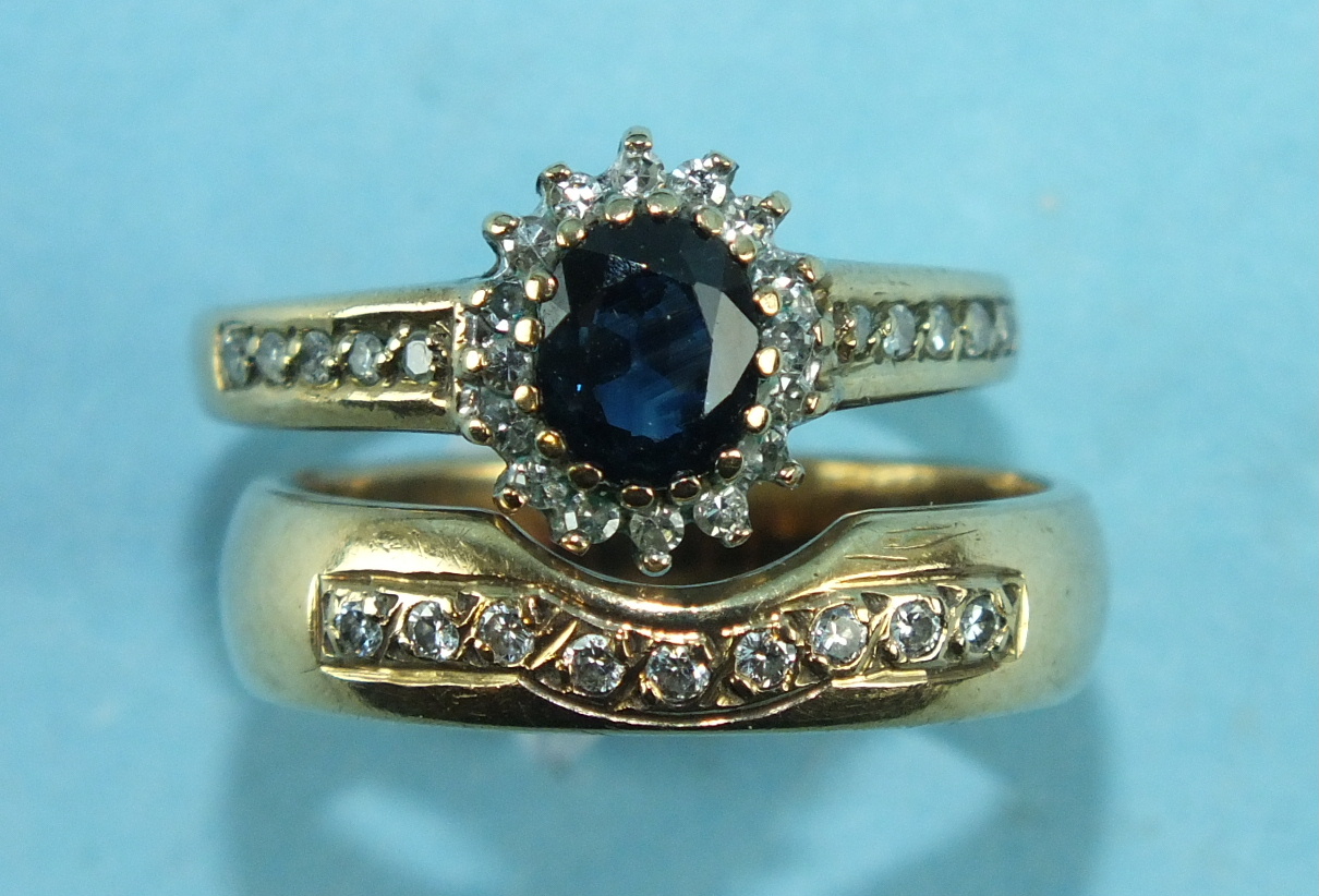 A 9ct gold ring set sapphire and diamond cluster between diamond-set shoulders, size L and a