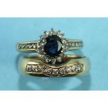 A 9ct gold ring set sapphire and diamond cluster between diamond-set shoulders, size L and a