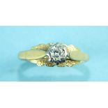 A solitaire diamond ring, the brilliant-cut diamond claw set in 18ct yellow and white gold mount,
