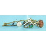 A 9ct gold brooch set pearl, a 9ct gold ring set banded agate, size T½ and another ring set opal