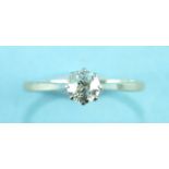 A solitaire diamond ring claw-set an old brilliant-cut diamond of approximately 0.5cts, in 18ct