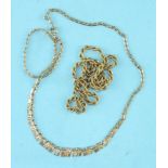 A 9ct gold rope-twist neck chain and a 9ct gold fringe necklace, total weight 8g, (2).