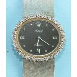 Rolex, a ladies 18ct white gold diamond-set Rolex Cellini wrist watch c1970's, the oval black dial