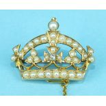 A Victorian 15ct gold brooch in the form of a royal crown set 8/8-cut diamond and demi-pearls,