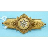 A Victorian 15ct gold brooch set a cluster of seven old brilliant-cut diamonds, on cannetile-