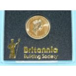 A Britannia 1987 ¼oz £25 gold coin, cased.