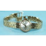 Helvetia, a ladies wrist watch with 9ct gold case and integral bracelet, 18.7g.