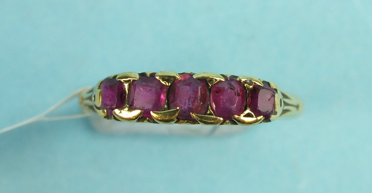 A five stone ruby half hoop ring in yellow gold mount, (af), size R, 2.6g.