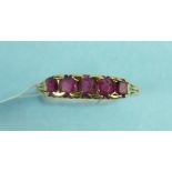 A five stone ruby half hoop ring in yellow gold mount, (af), size R, 2.6g.