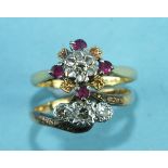 A 9ct gold and platinum cross-over ring set three 8/8-cut diamonds, size M½ and a ruby and diamond