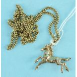 A 9ct gold pendant in the form of a prancing horse, set 8/8-cut diamonds, on 9ct gold curb-link