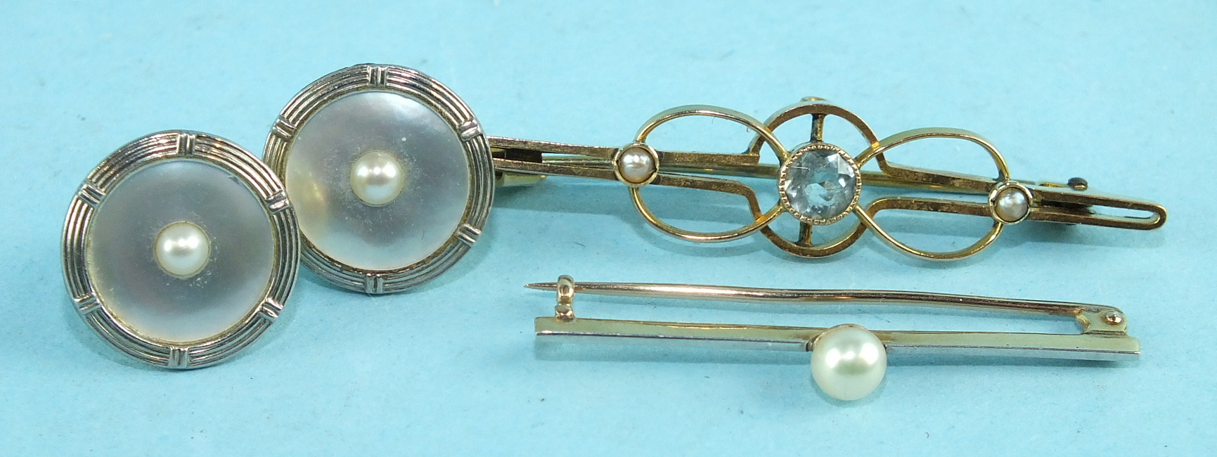 A pair of 18ct gold, mother-of-pearl and pearl-set ear studs, (converted from cufflinks), a 9ct gold