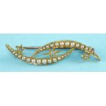 A Victorian brooch in the form of two pearl-set crescents with three diamond-set stars, in