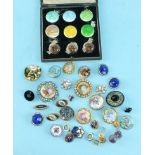 Six guilloche enamelled button covers, (of a set of nine), cased, three reverse intaglio lion's head