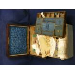 An inlaid mother of pearl sewing box tog