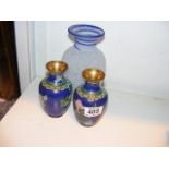 A pair of cloisonne vases together with