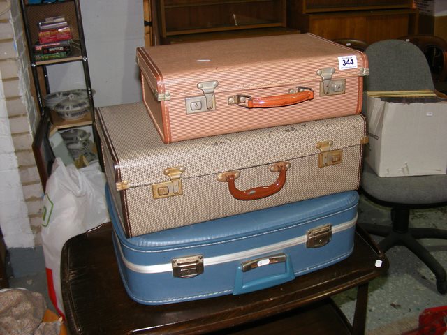 Three vintage retro suitcases