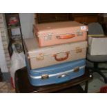 Three vintage retro suitcases