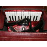 A Golotta accordian in case