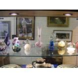 A collection of glassware vases, paperweights etc to include Caithness,