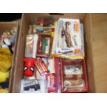 A carton containing a quantity of boxed and unboxed diecast cars together with model kits etc