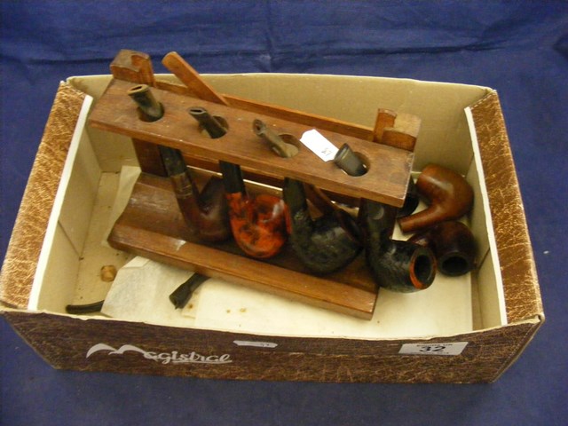 A collection of pipes together with a pipe rack