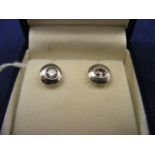 A diamond 18ct White Gold earrings (silver butterflies)