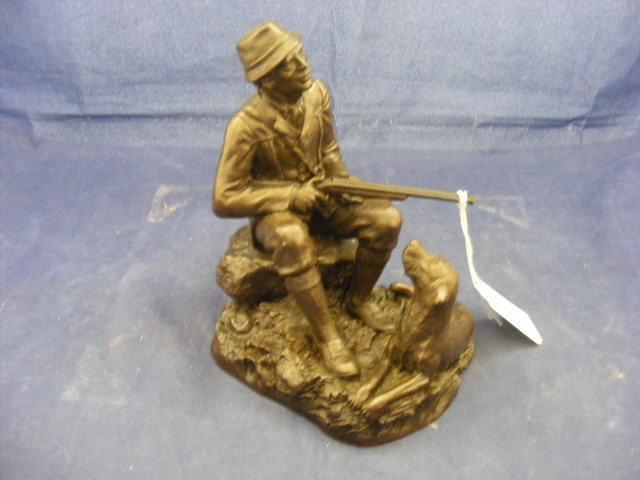 A modern R Chadwick bronzed resin figure of a shooting dog scene