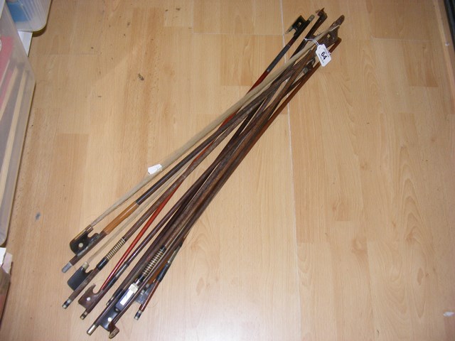 A quantity of violin bows