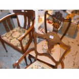 Three antique chairs of varying designs