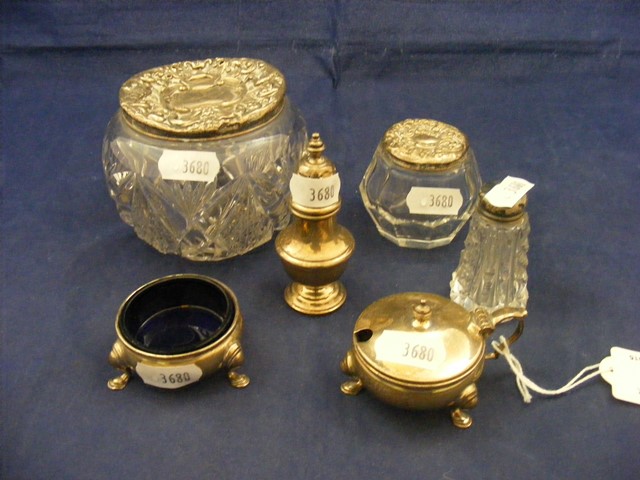 A quantity of silver items to include salt pot, mustard pot,