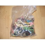 A sealed bag of costume jewellery