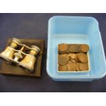A quantity of coins to include old pennies together with a pair of cased opera binoculars
