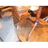 A wine rack together with two round pedestal tables